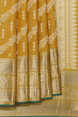 Collection of Kanchipuram Silk Spring Yellow Saree in a gallery layout