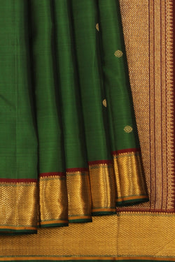 Collection of Kanchipuram Silk Green Saree in a gallery layout