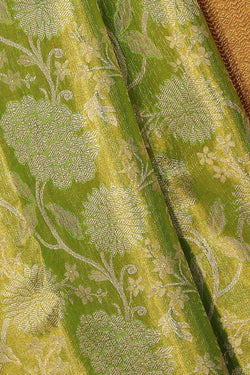 Collection of Kanchipattu Tissue Brocade Green Saree in a gallery layout