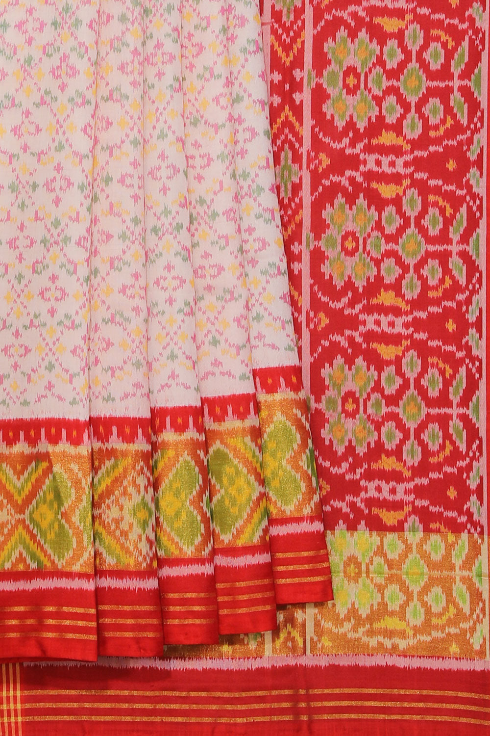 Collection of Rajkot Patola Silk Off-White Saree in a gallery layout