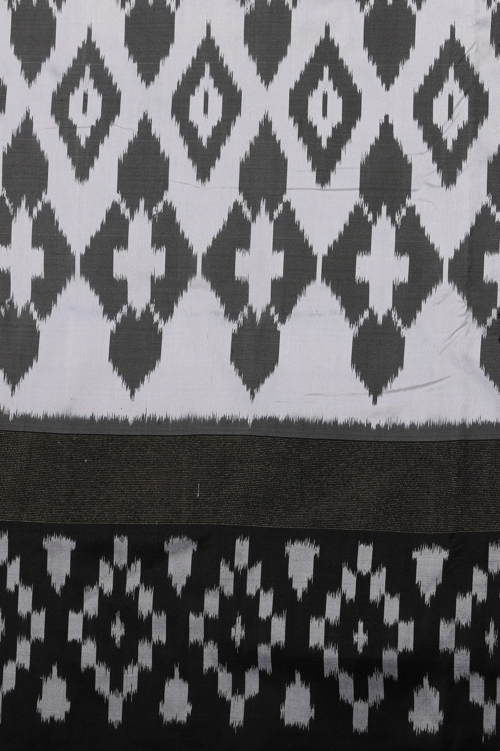 Image of Pochampally Silk Ikat White Saree