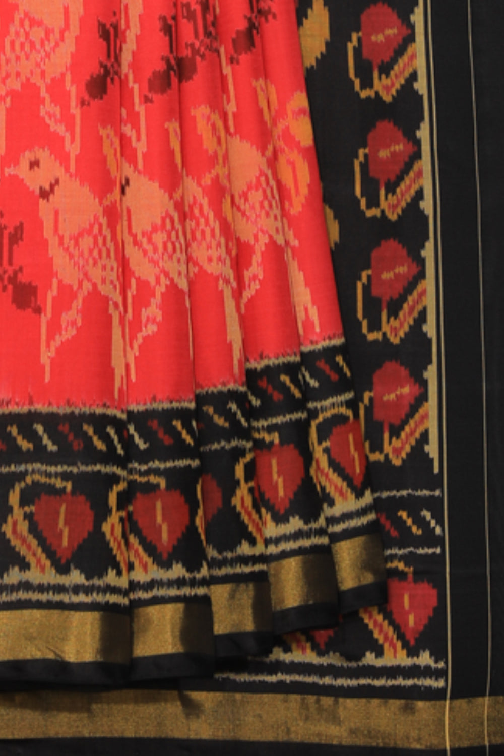 Collection of Rajkot Patola Silk Coral Red Saree in a gallery layout