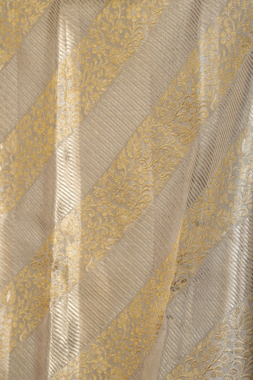 Collection of Kanchipattu Tissue Brocade Gold Saree in a gallery layout