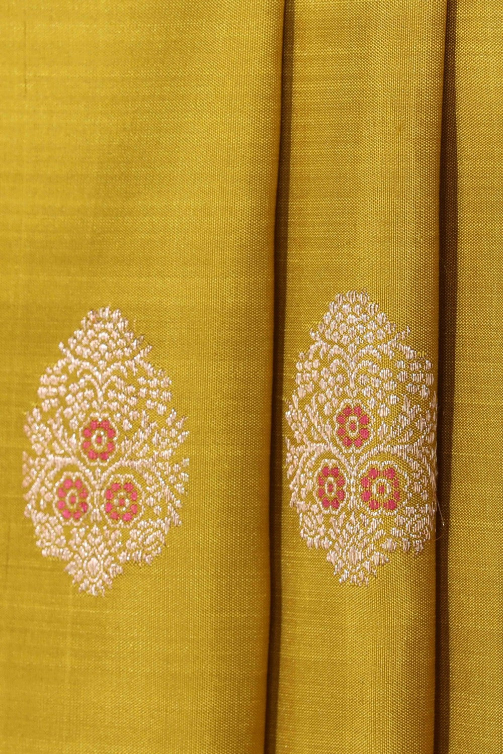 Collection of Kanjivaram Silk Yellow Saree in a gallery layout