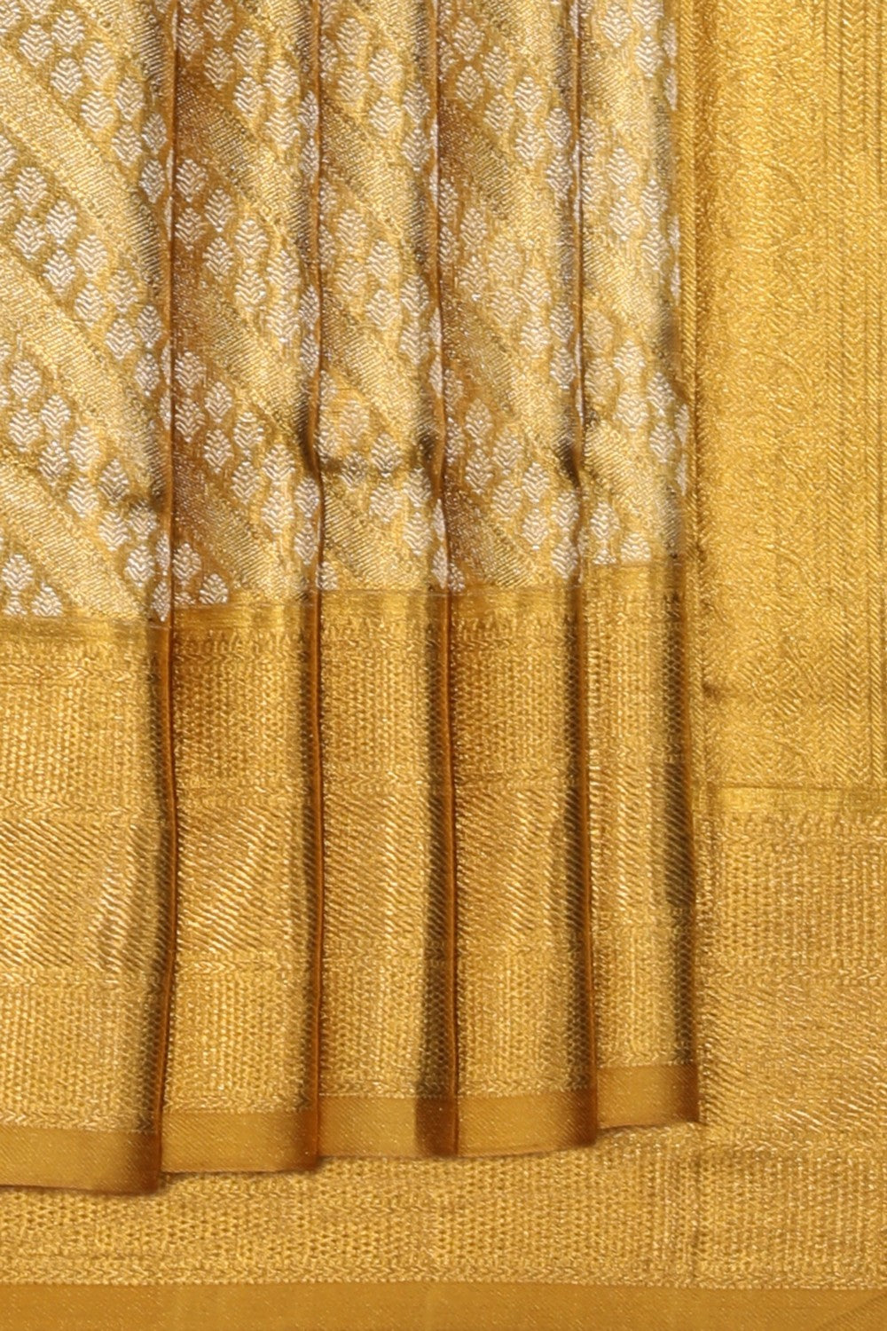 Collection of Kanjivaram Silk Gold Saree in a gallery layout