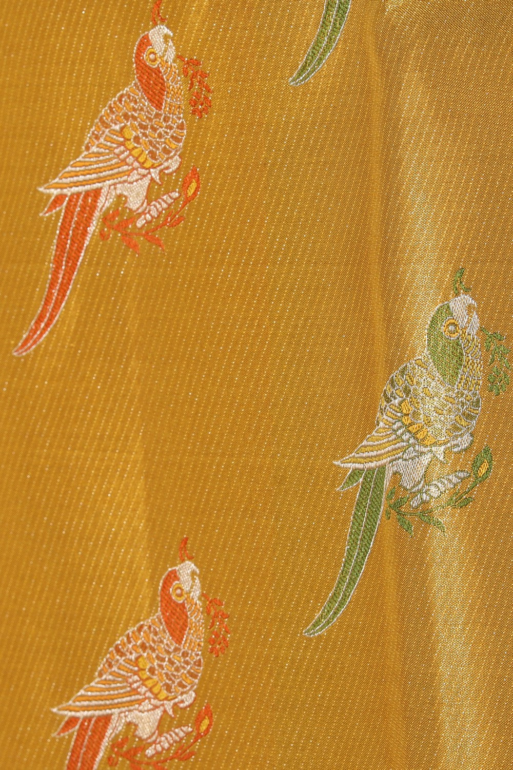 Collection of Kanchipattu Tissue Gold Saree in a gallery layout