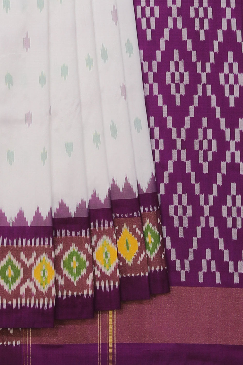 Collection of Pochampally Ikat Silk White Saree in a gallery layout