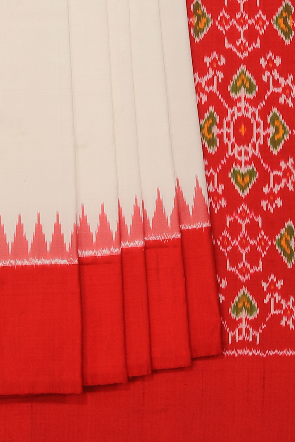 Collection of Pochampally Ikat White Saree in a gallery layout