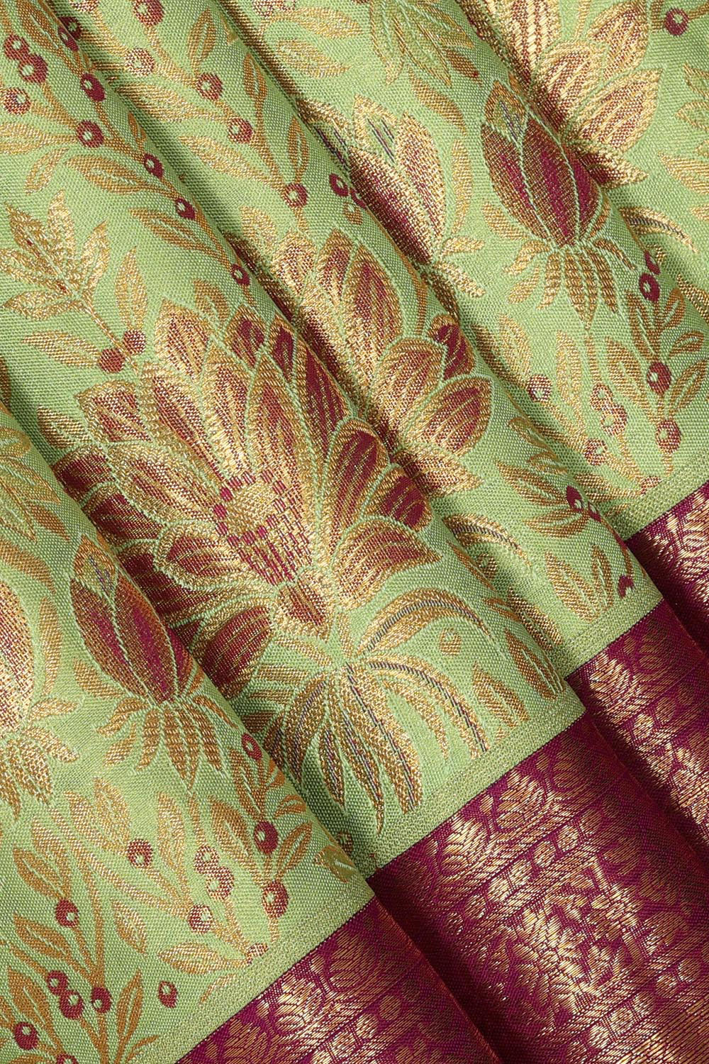 Collection of Kanchipattu Tissue Brocade Green Saree in a gallery layout