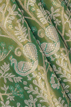 Collection of Kanchipattu Teal Green Tissue Brocade Saree in a gallery layout