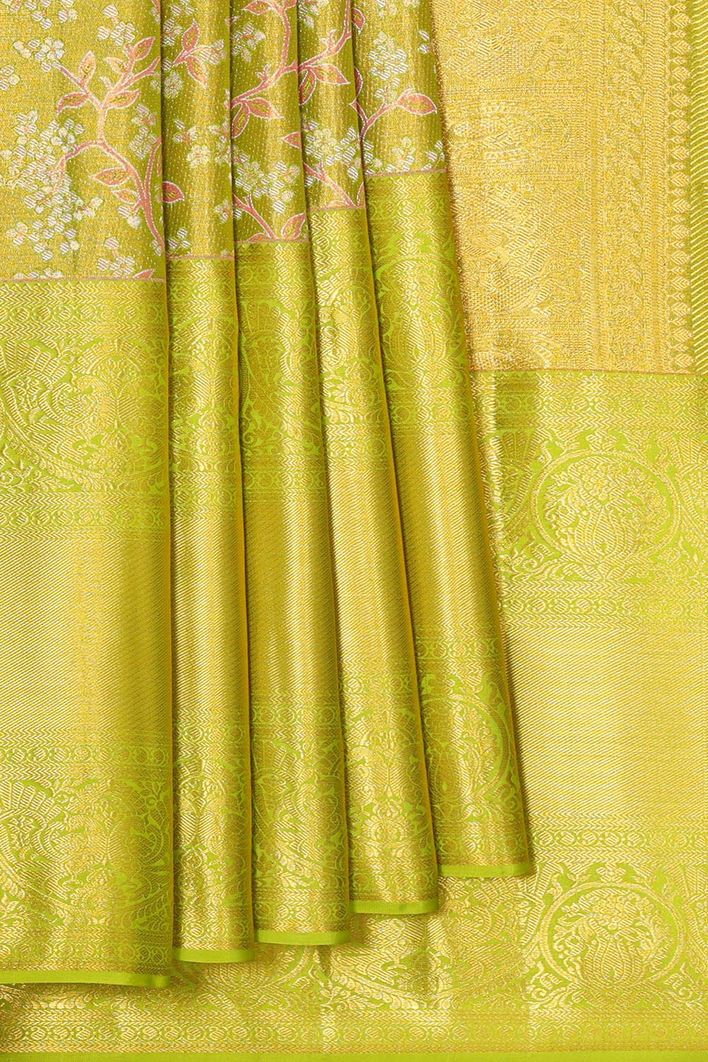 Collection of Kanchipattu Parrot Green Tissue Brocade Saree in a gallery layout