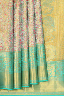 Collection of Kanchipattu Turquoise Blue Tissue Brocade Saree in a gallery layout