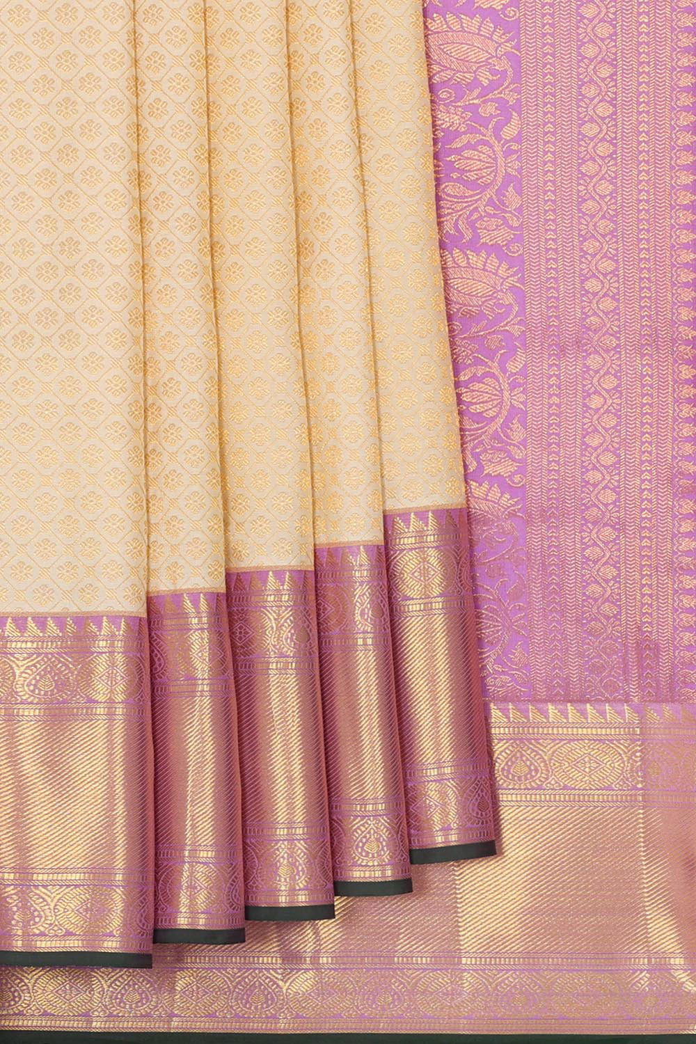 Collection of Kanchipattu Cream Brocade Saree in a gallery layout