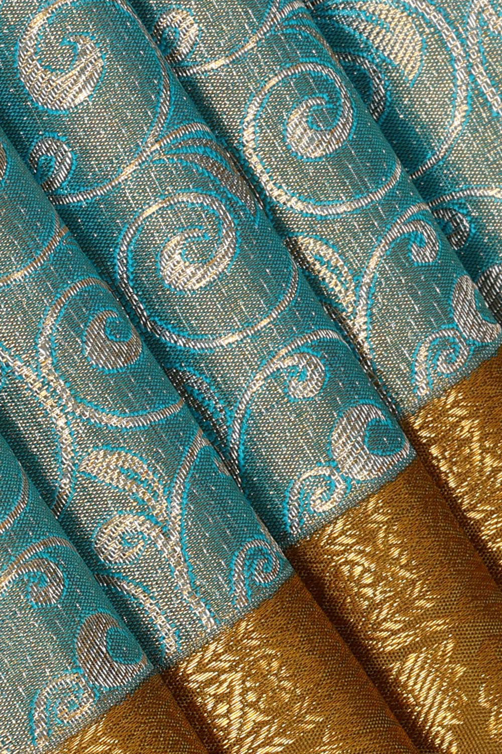 Image of Kanchipattu Blue Tissue Pavada Unstitched Set
