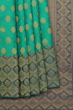 Collection of Gorgeous Silk Sea Green Saree in a gallery layout