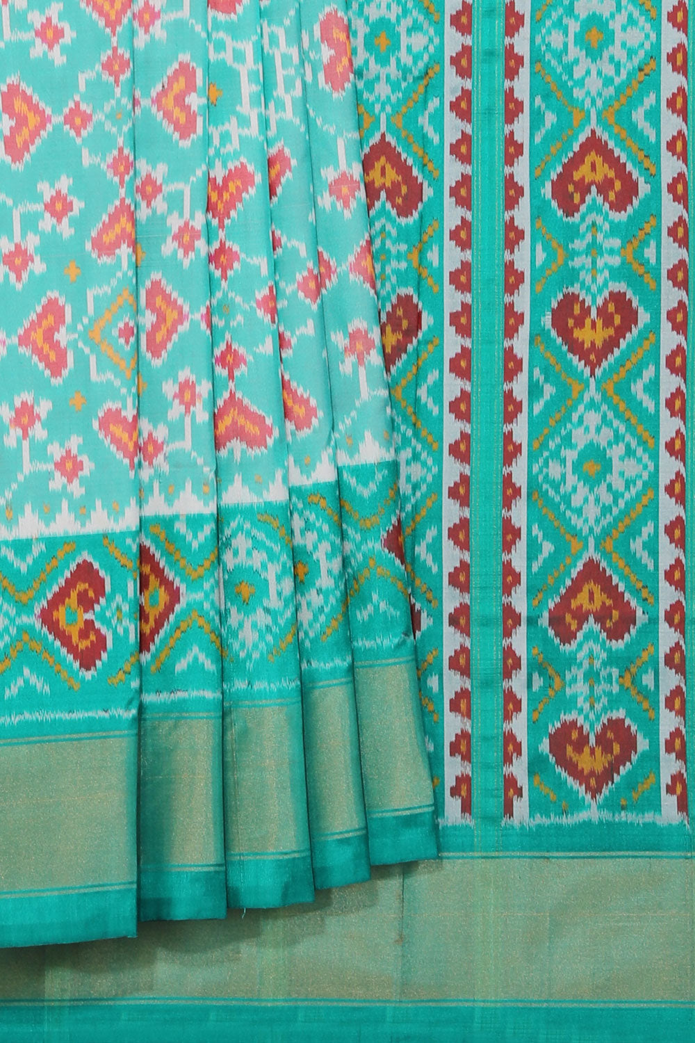 Collection of Pochampally Silk Ikat Sea-Green Saree in a gallery layout