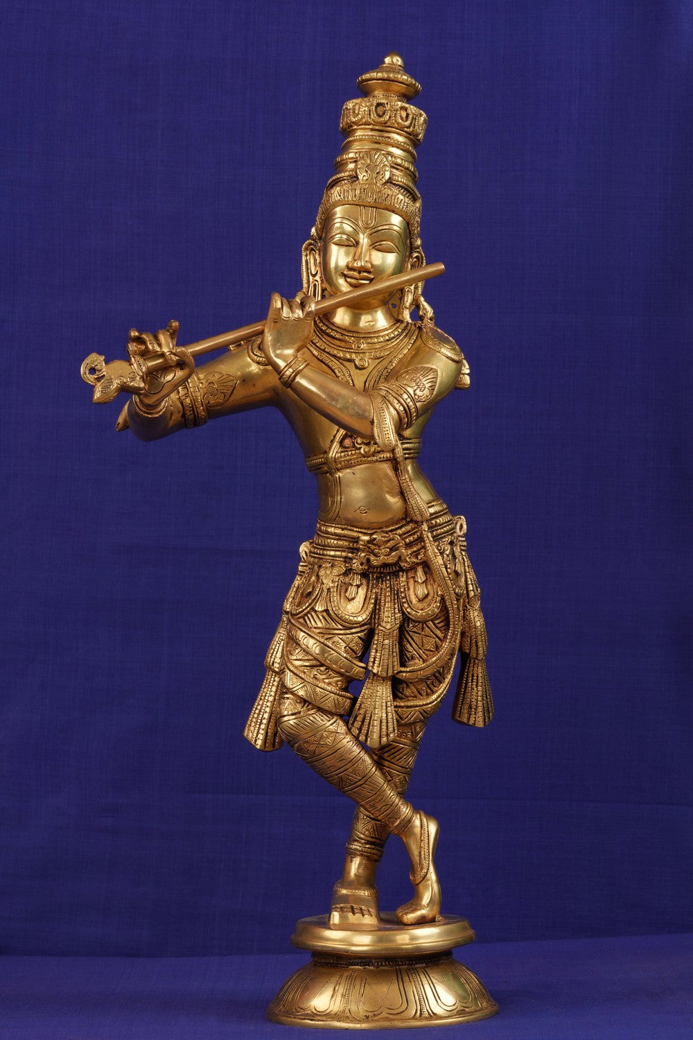 Image of krishna in standing style playing flute