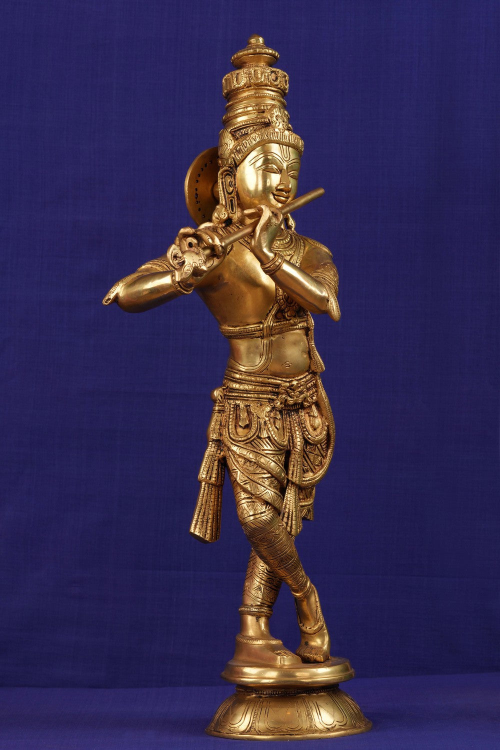 Image of krishna in standing style playing flute