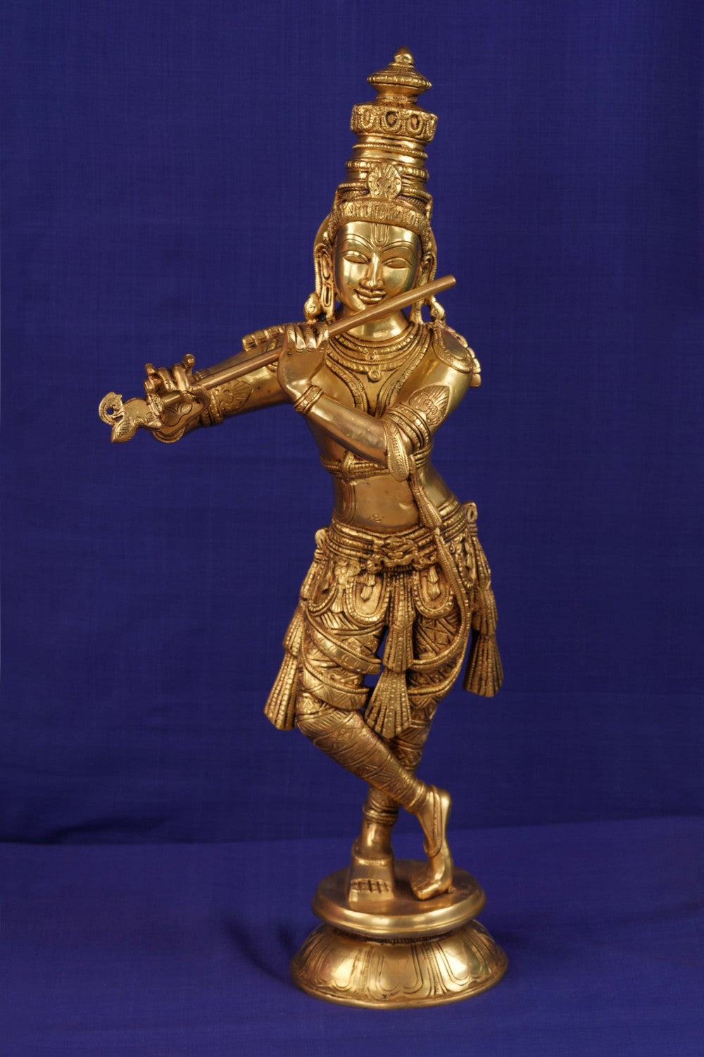 Image of krishna in standing style playing flute