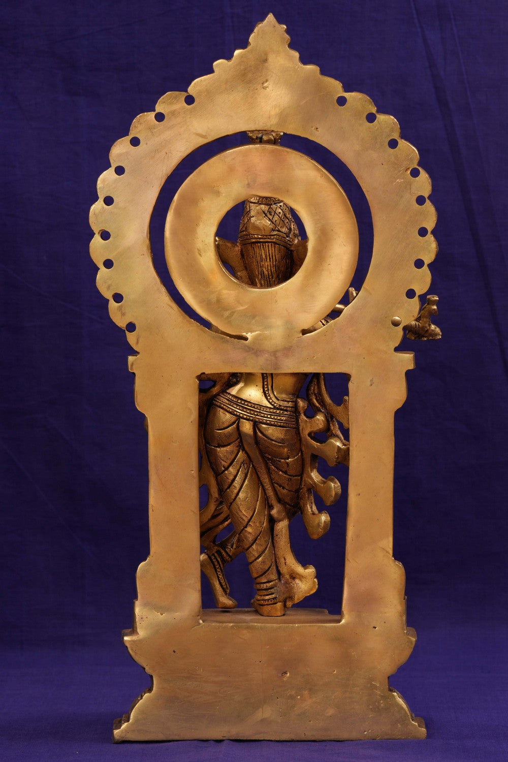 Brass Krishna with flute in his hand