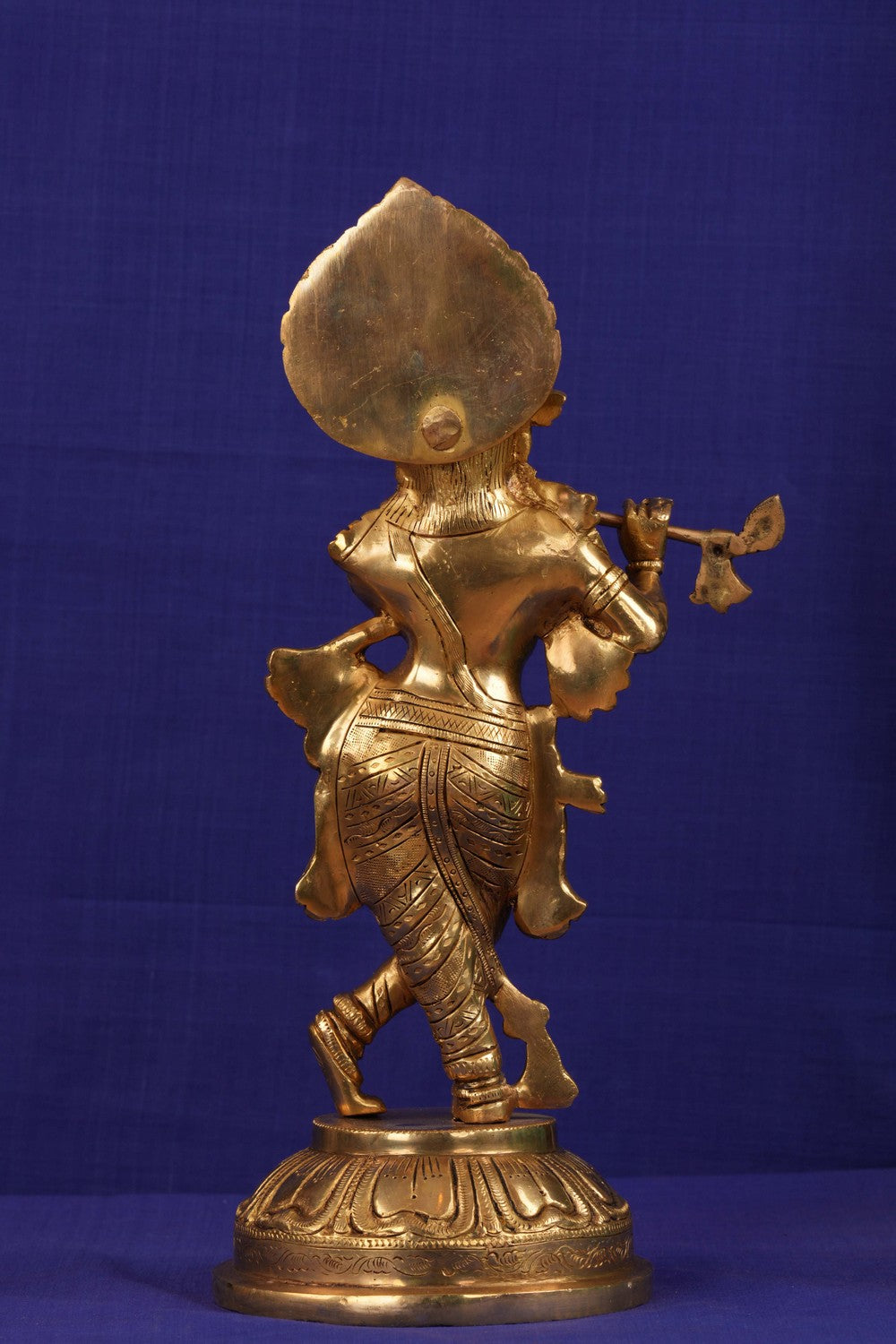 Brass Krishna with flute in his hand