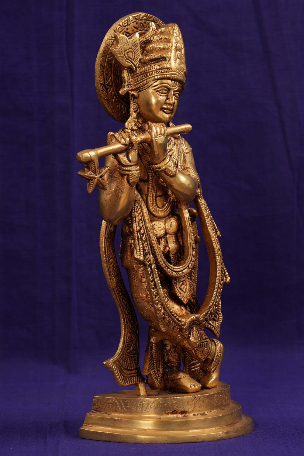 Brass Krishna with flute in his hand