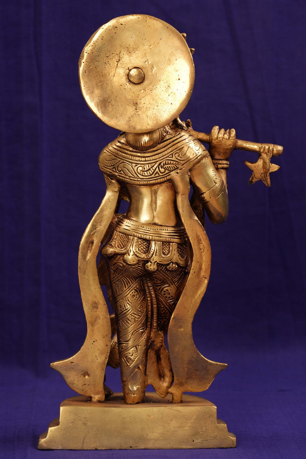 Brass Krishna with flute in his hand
