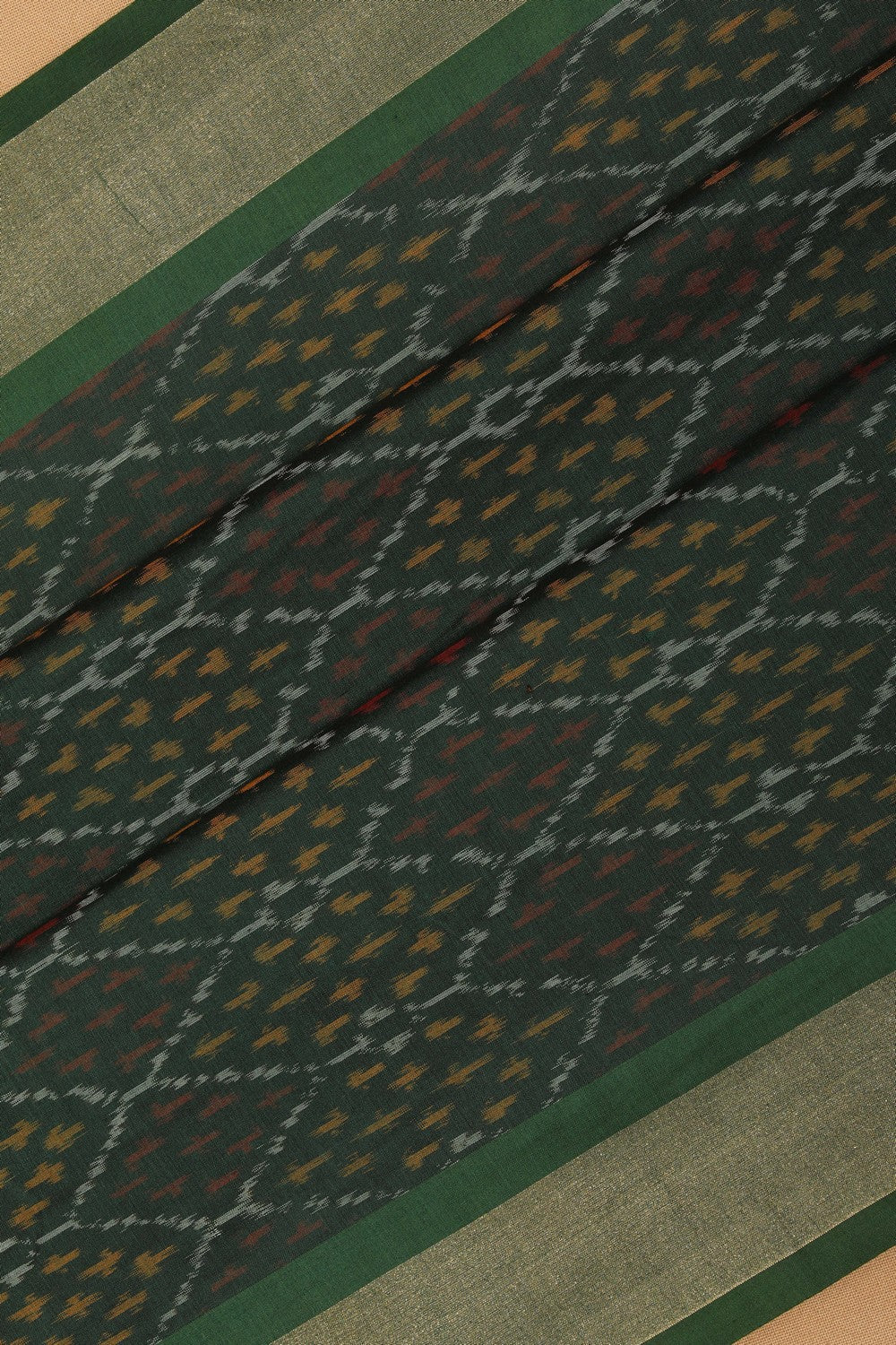 Image of Pochampally Ikat Bottle Green Saree