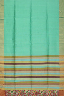 Image of A Dupion silk saree with an Ikat pallu