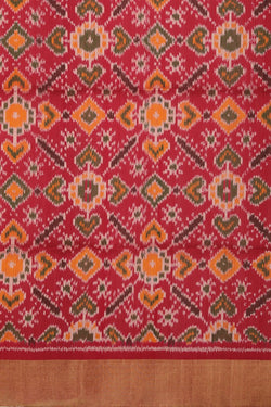 Image of A Dupion silk saree with an Ikat pallu