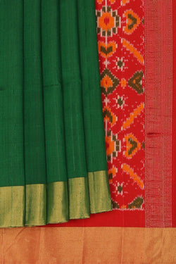 Image of A Dupion silk saree with an Ikat pallu