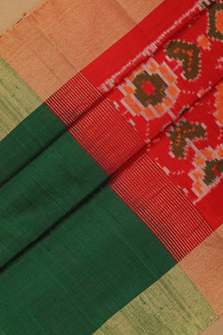 Image of A Dupion silk saree with an Ikat pallu