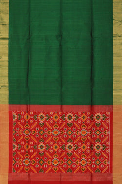 Image of A Dupion silk saree with an Ikat pallu