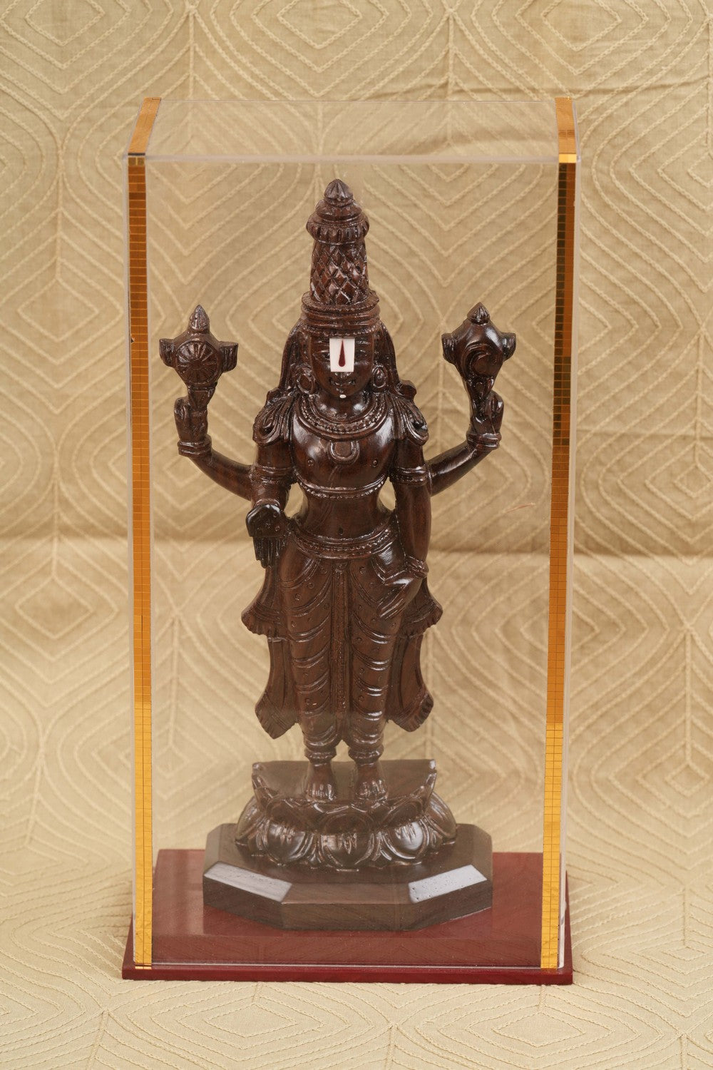 Image of Sculptures crafted from rosewood that depict Lord Balaji