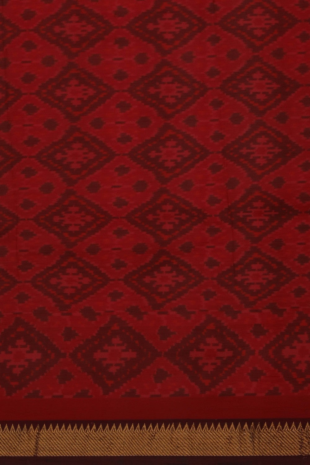 Image of A Coral-Pink Saree With Patola Border