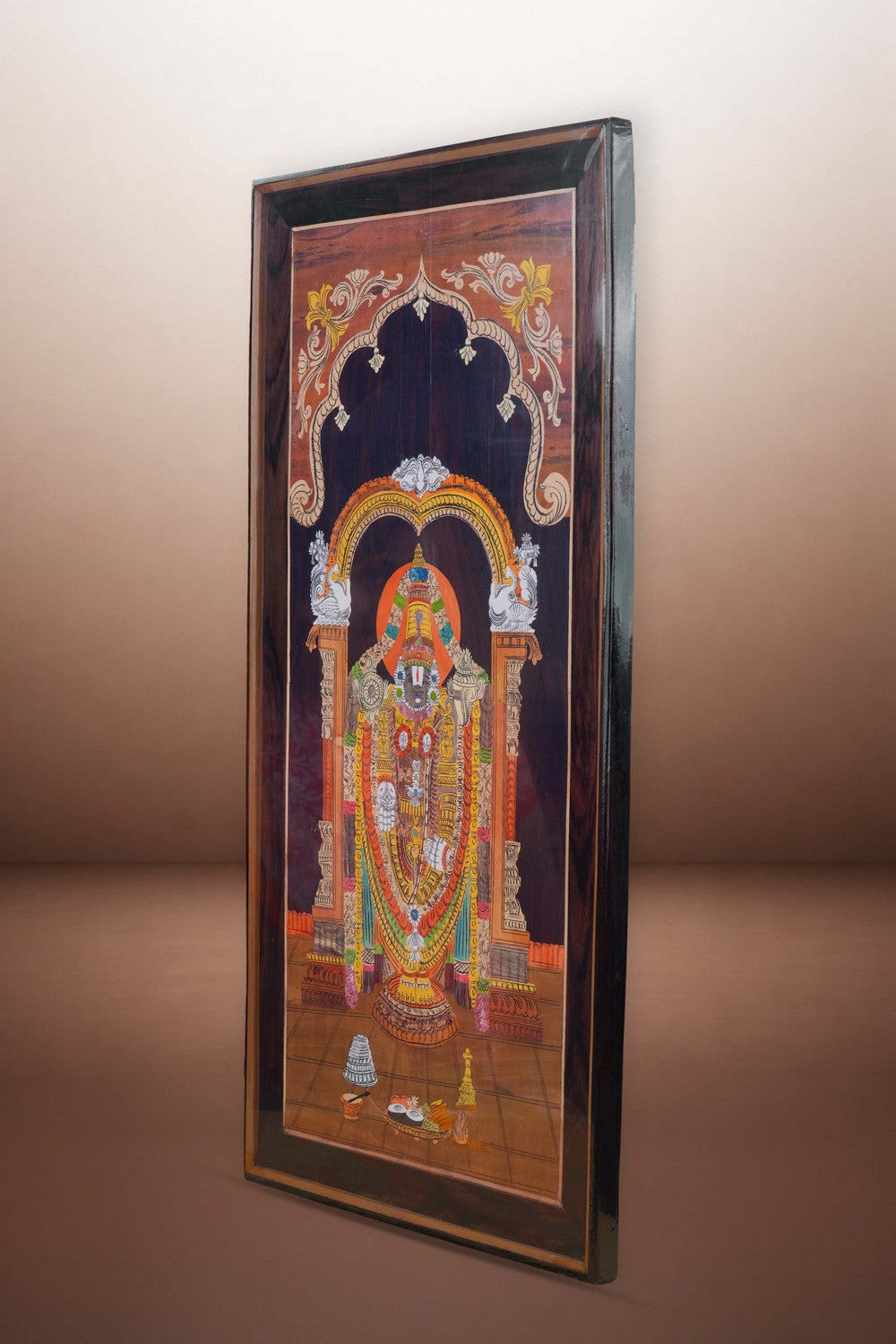 Image of Tirupati Balaji with panel in rosewood with inlay work