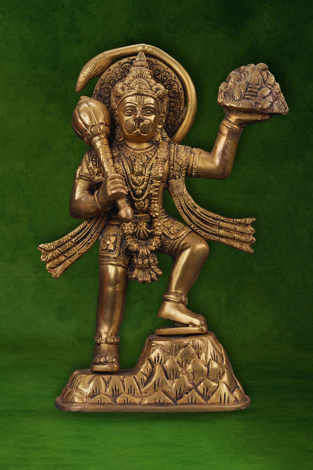 Image of A brass Hanuman statue carrying the Sanjeevani mountain