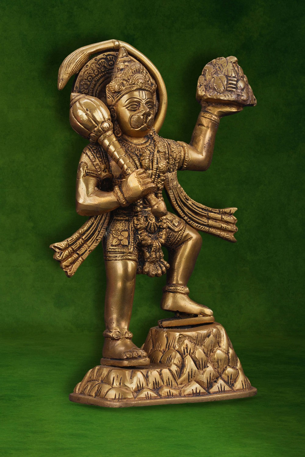 Image of A brass Hanuman statue carrying the Sanjeevani mountain