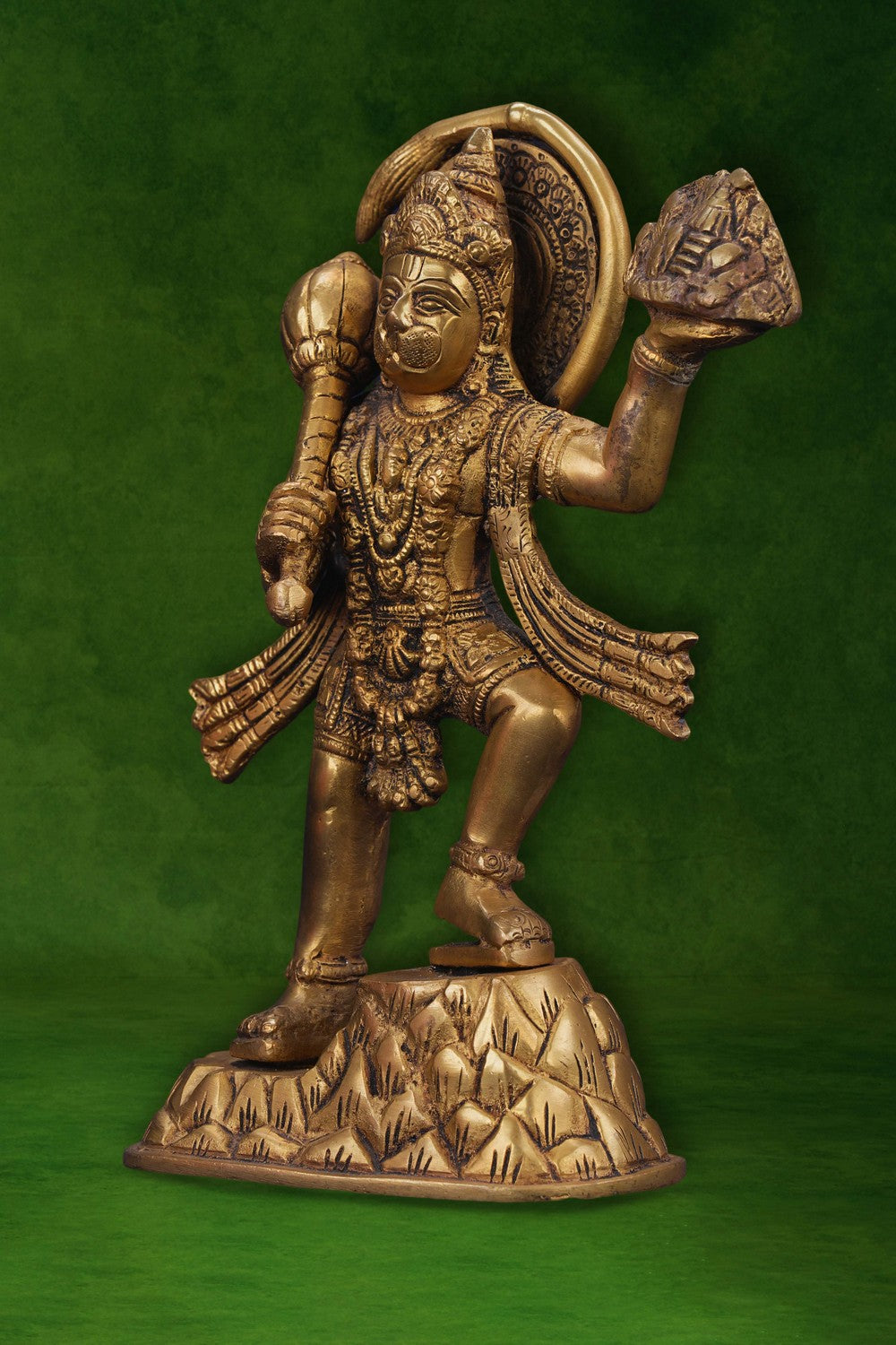 Image of A brass Hanuman statue carrying the Sanjeevani mountain