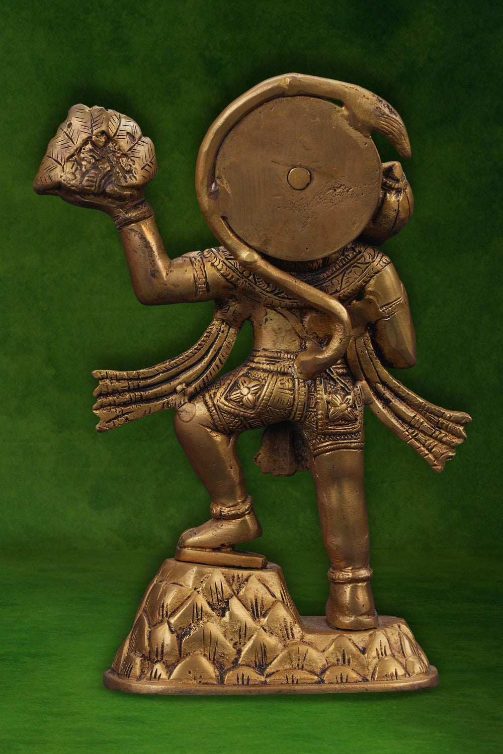 Image of A brass Hanuman statue carrying the Sanjeevani mountain