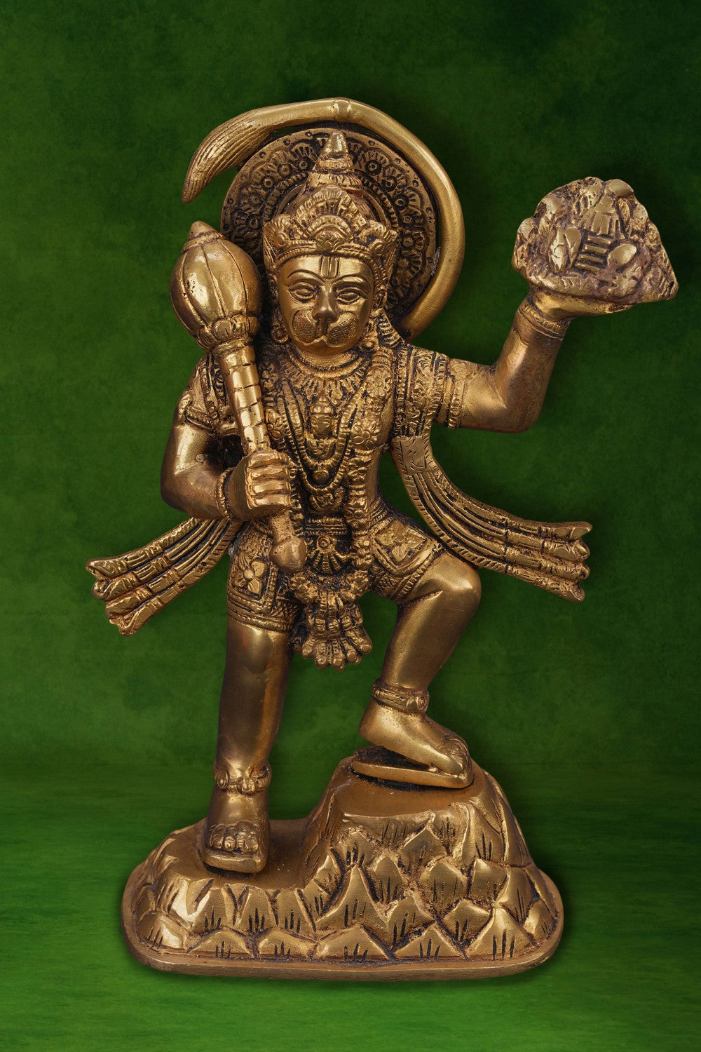 Image of A brass Hanuman statue carrying the Sanjeevani mountain