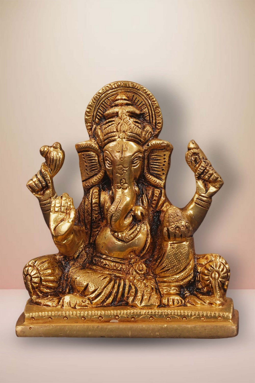 Image of Brass Ganesha In Sitting Style With Laddoo