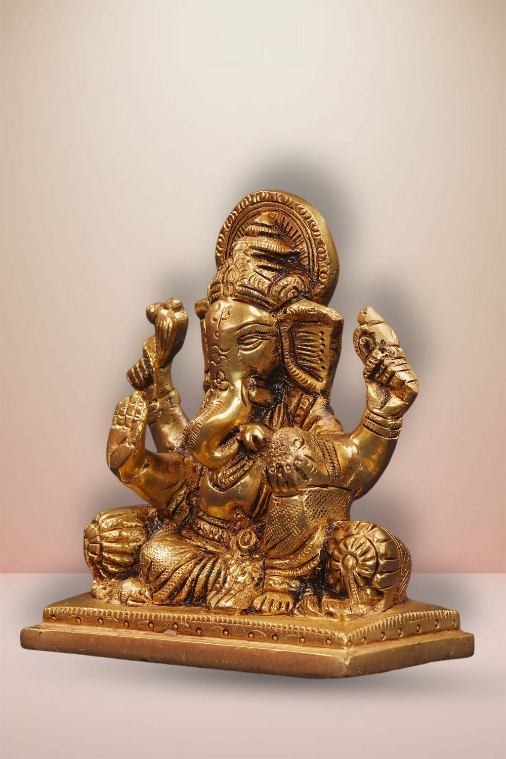 Image of Brass Ganesha In Sitting Style With Laddoo