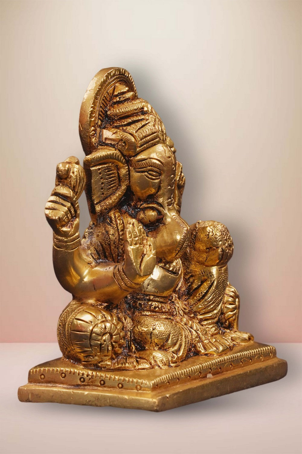 Image of Brass Ganesha In Sitting Style With Laddoo