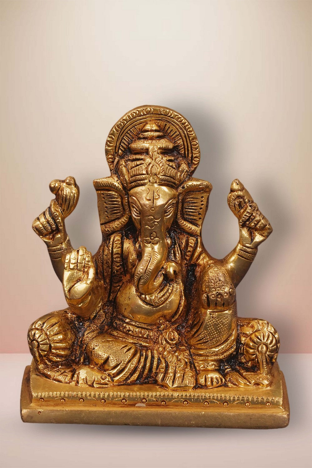 Image of Brass Ganesha In Sitting Style With Laddoo