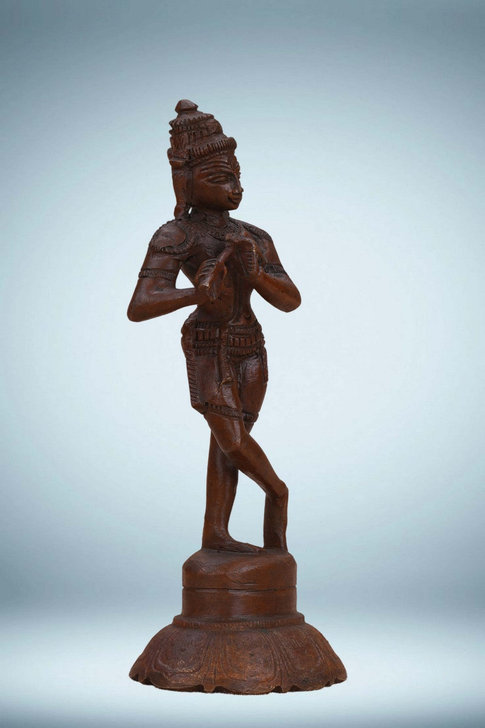 Image of Bronze Krishna playing the flute in a standing