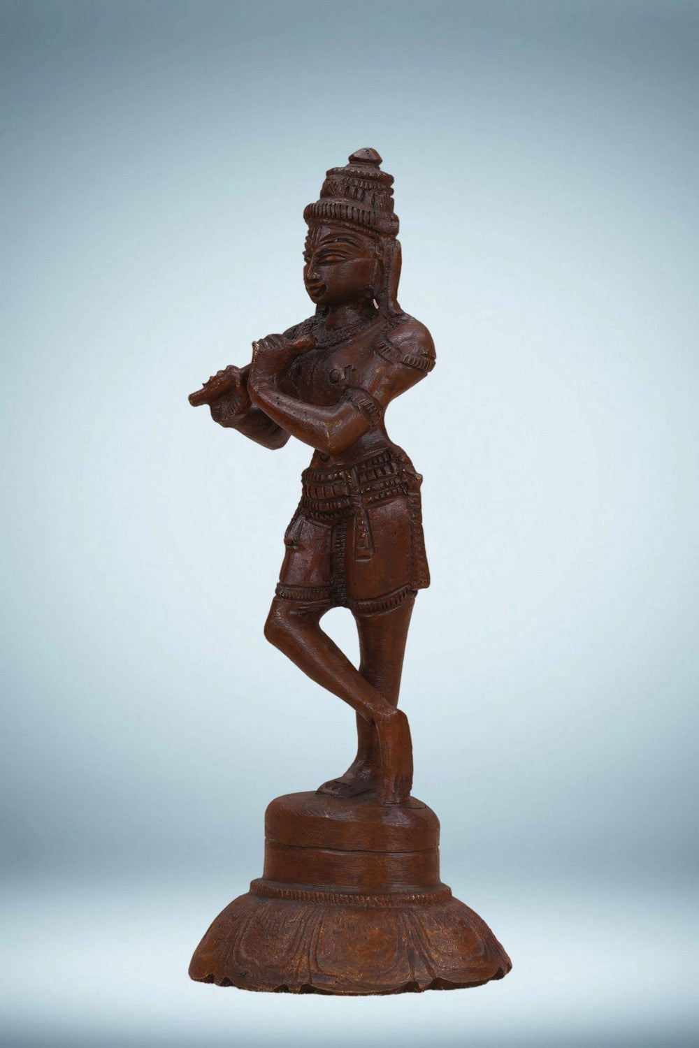 Image of Bronze Krishna playing the flute in a standing