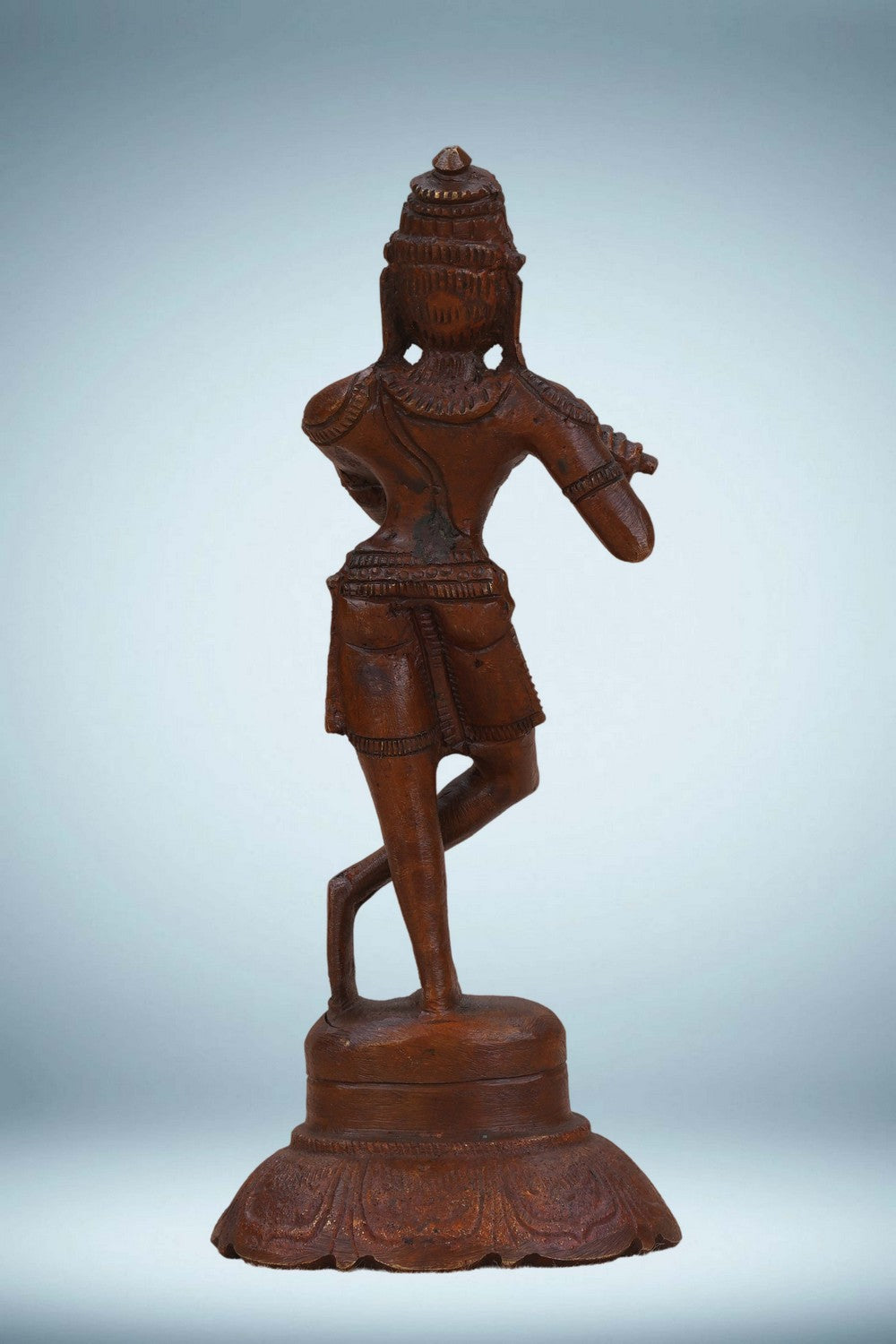 Image of Bronze Krishna playing the flute in a standing
