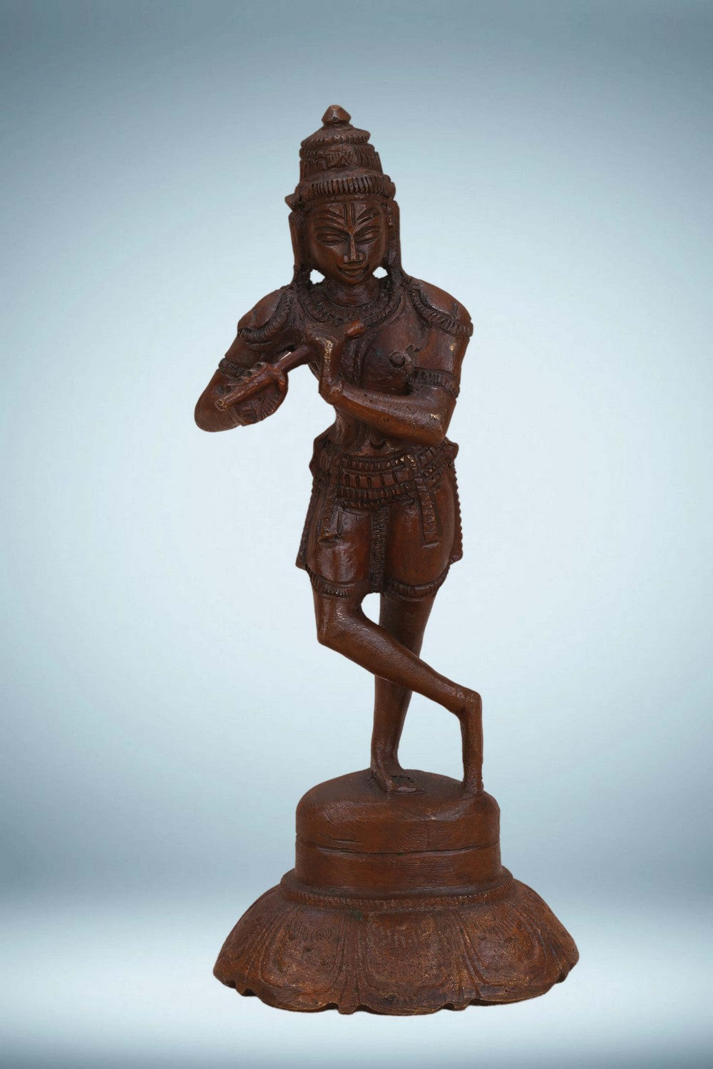 Image of Bronze Krishna playing the flute in a standing