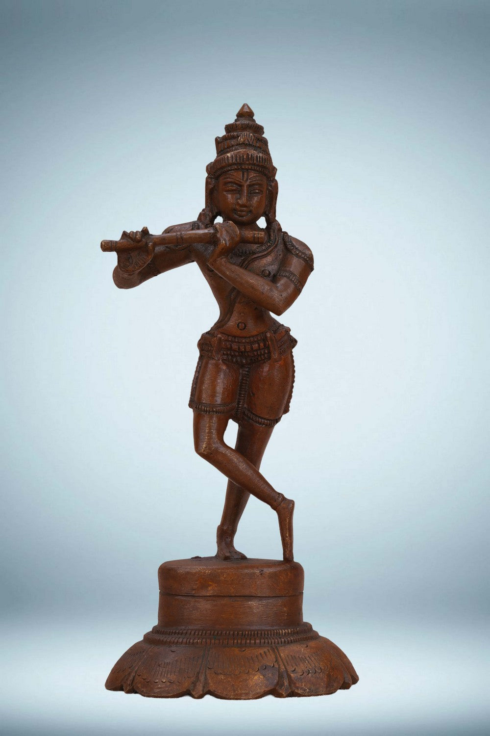 Image of Bronze Krishna playing the flute in a standing